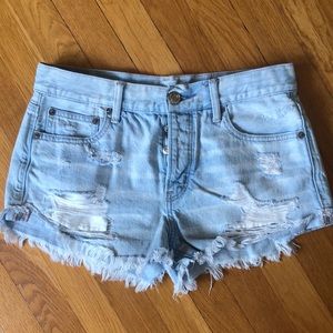 Light wash ripped jean shorts